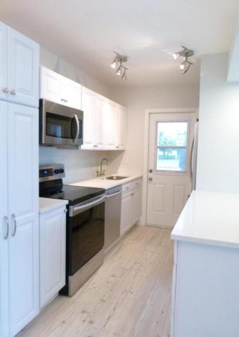 Boynton Beach: Renovation. Retrofitted, painted cabinets.