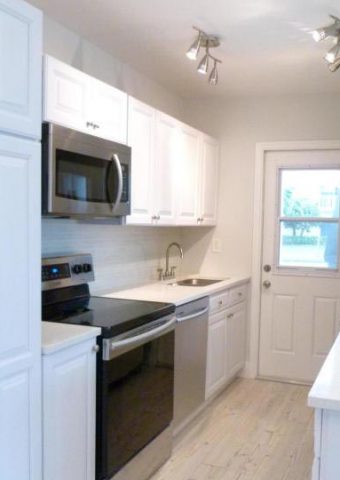 Boynton Beach: Renovation. Retrofitted, painted cabinets.